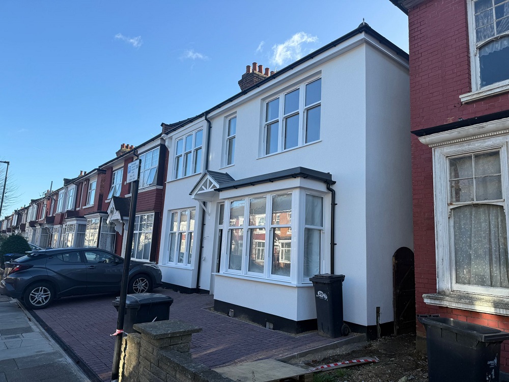 Angled street view of renovated residential property exterior