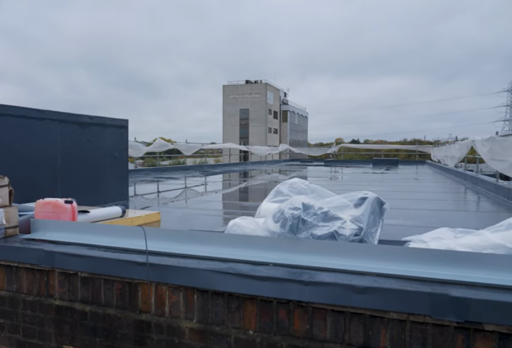 Newly installed flat roofing system on commercial building