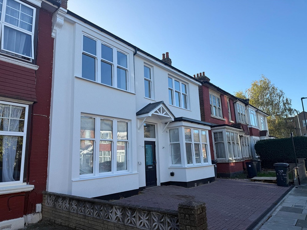 Newly renovated semi-detached house with modern white exterior finish